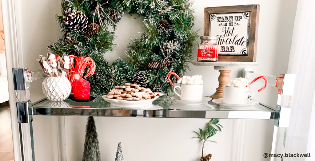 An influencer's hallway table decorated with holiday-themed treats and snacks for a Creator collaboration with a brand.